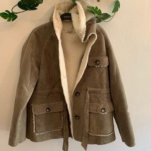 Olive colored sheep coat